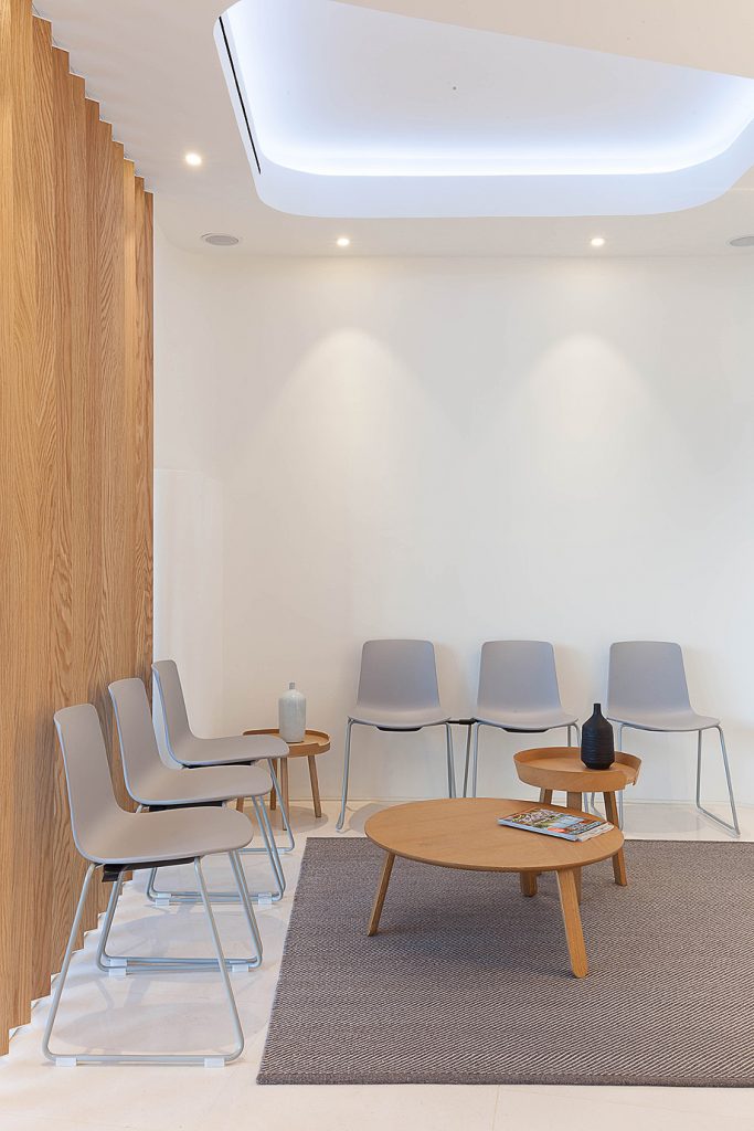 Contemporary dental office with spacious reception area and waiting room